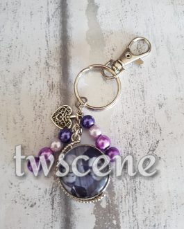 Double sided charmed keyring