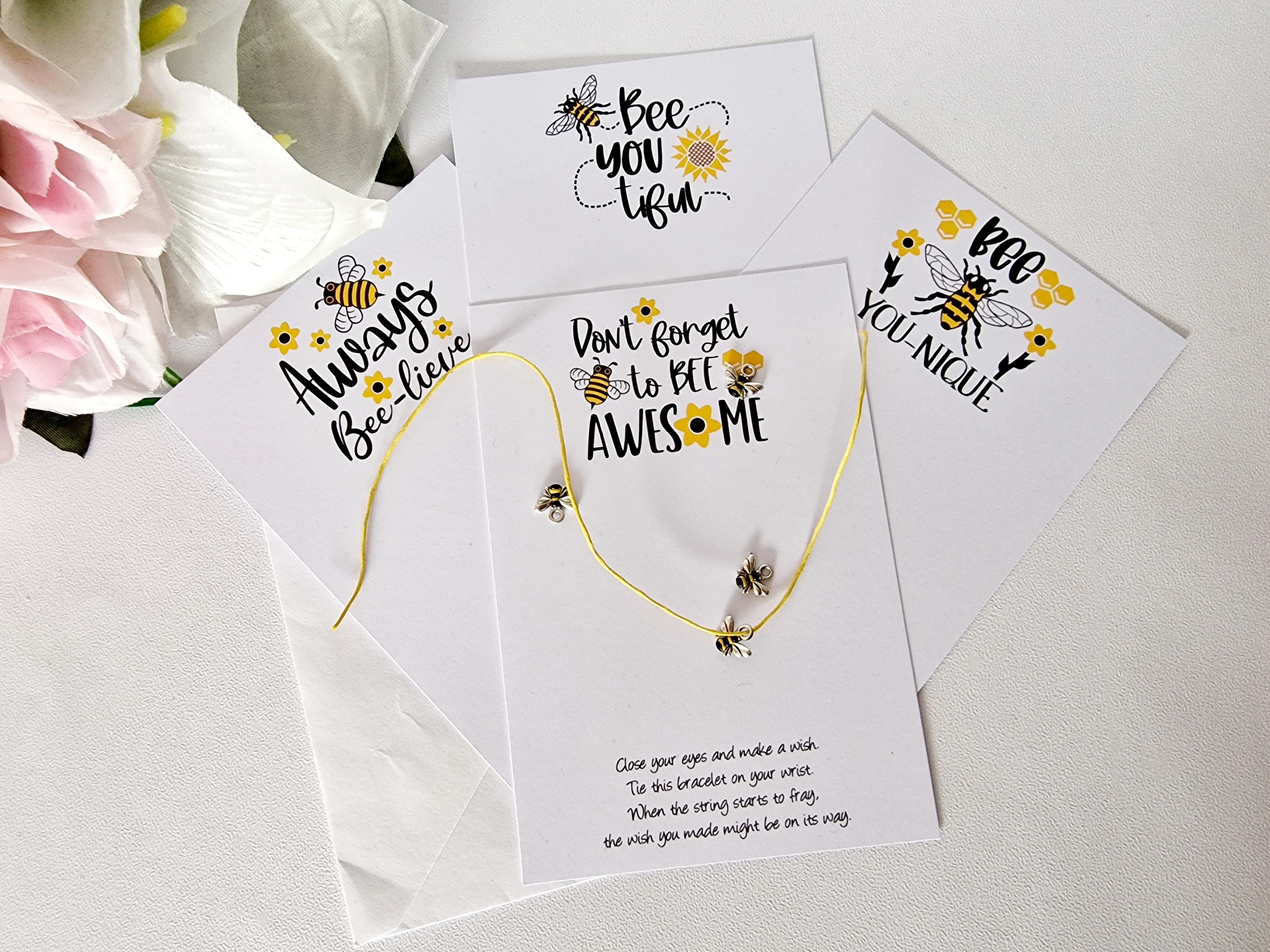 4 pack bee inspiration wish bracelets with colour charm, card and envelope