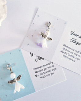 Guardian angel charm on backing card